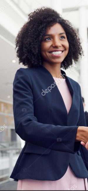 Cropped shot of an attractive young businesswoman shaking hands with a businessman in a modern workplace